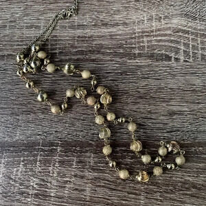 Vintage Monet Gold-Tone Alternating Textures Ball Beaded
Long Necklace Women’s